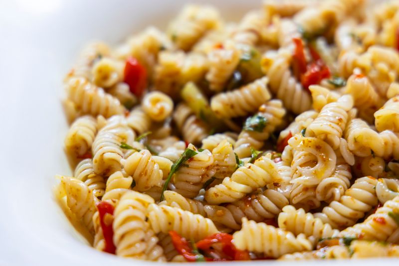 Italian pasta salad with olives sun-dried tomatoes and herbs